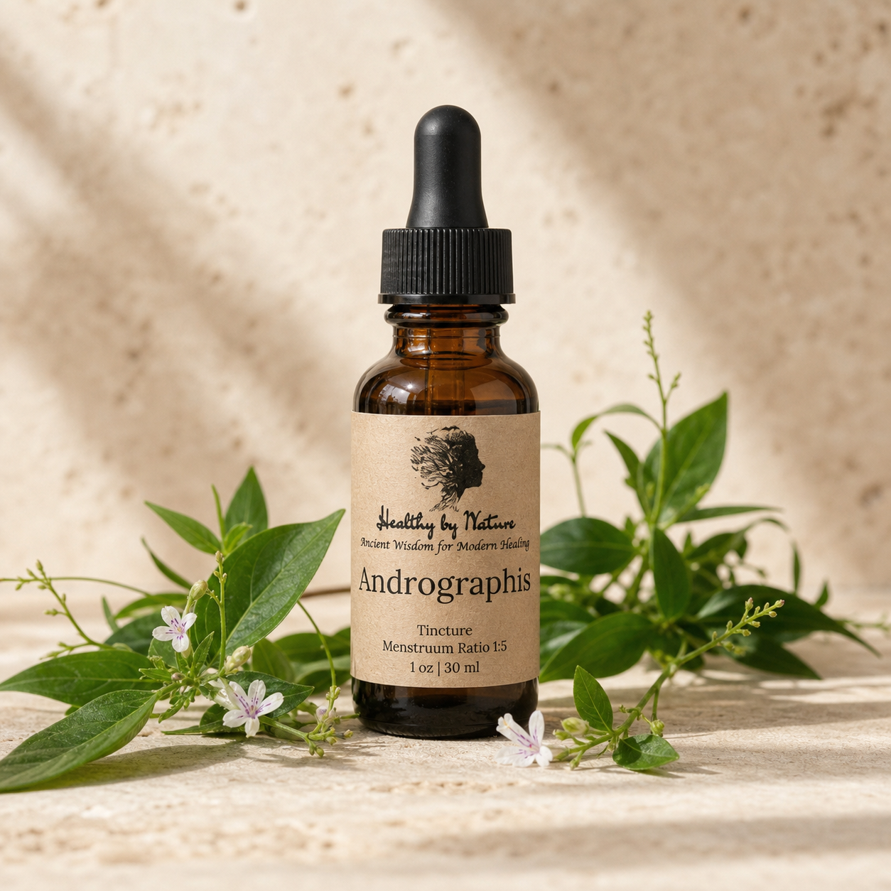 Andrographis tincture bottle with kraft paper label and flowering herb