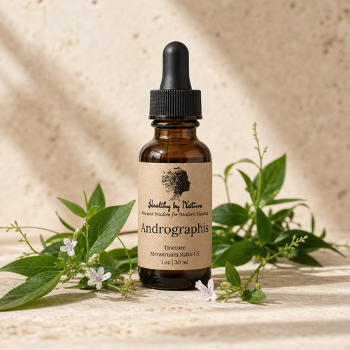 Andrographis tincture bottle with kraft paper label and flowering herb